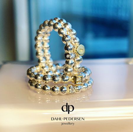 Sølv kuleringer med gulldetaljer